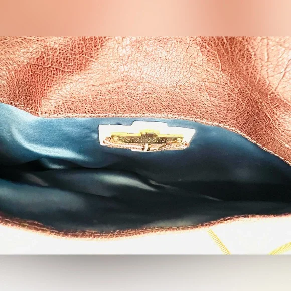 Henri Bendel leather fold over asymmetrical slim clutch